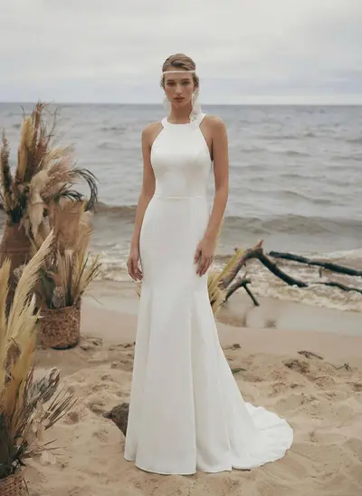 Trumpet/Mermaid Sleeveless Halter Elastic Satin Sweep Train Wedding Dresses With Bow(s)