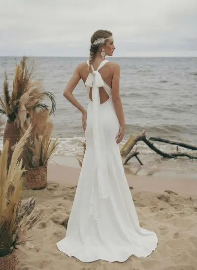 Trumpet/Mermaid Sleeveless Halter Elastic Satin Sweep Train Wedding Dresses With Bow(s)