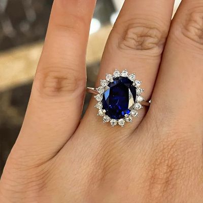 Luxurious Halo Oval Cut Blue Sapphire Engagement Ring
