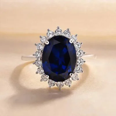 Luxurious Halo Oval Cut Blue Sapphire Engagement Ring