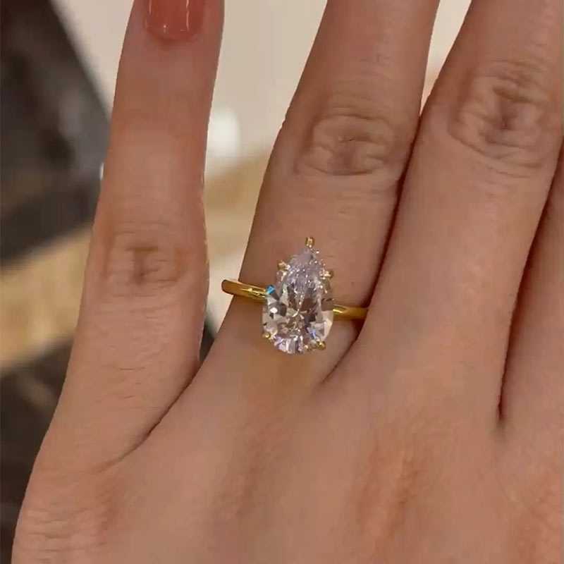 Classic Pear Cut Yellow Gold Engagement Ring In Sterling Silver