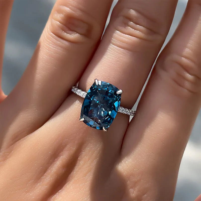 Exclusive Cushion Cut Montana Blue Sapphire Engagement Ring In Sterling Silver