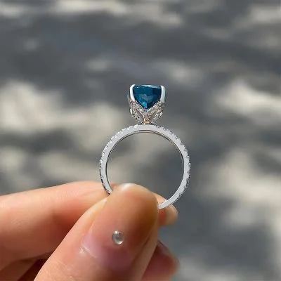 Exclusive Cushion Cut Montana Blue Sapphire Engagement Ring In Sterling Silver