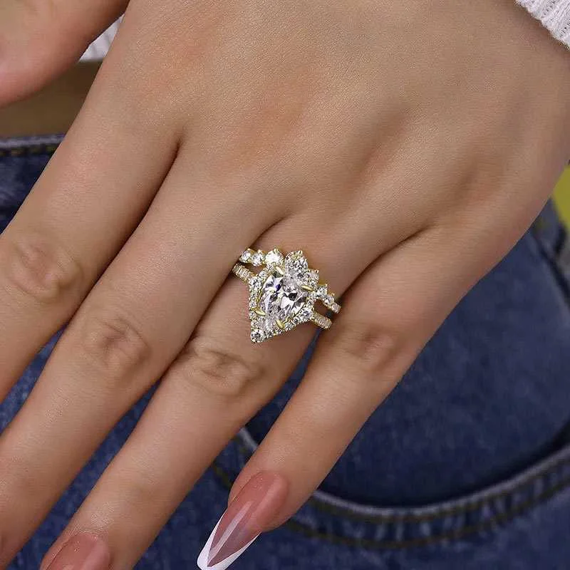 Elegant Rose Gold 2.2 Carat Halo Pear Cut Bridal Ring Set In Sterling Silver Elegant Rose Gold 2.2 Carat Halo Pear Cut Bridal Ring Set In Sterling Silver