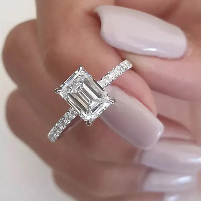 Classic Emerald Cut Women's Engagement Ring In White Gold