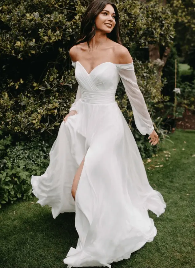 fitted lace wedding dress Monique Off-Shoulder Long Sleeve A-Line Lace Gown