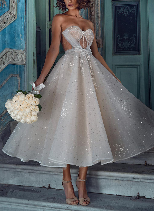 A-Line Sweetheart Sleeveless Sequined Wedding Dresses With Bow(s)