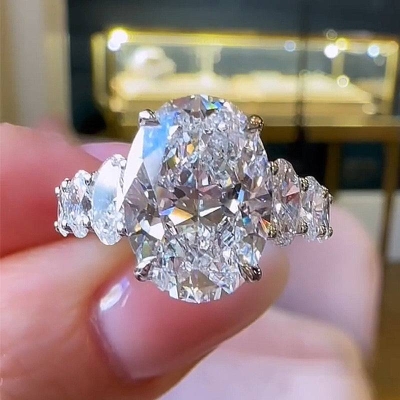 Luxury Crushed Ice Oval Cut Seven Stone Engagement Ring