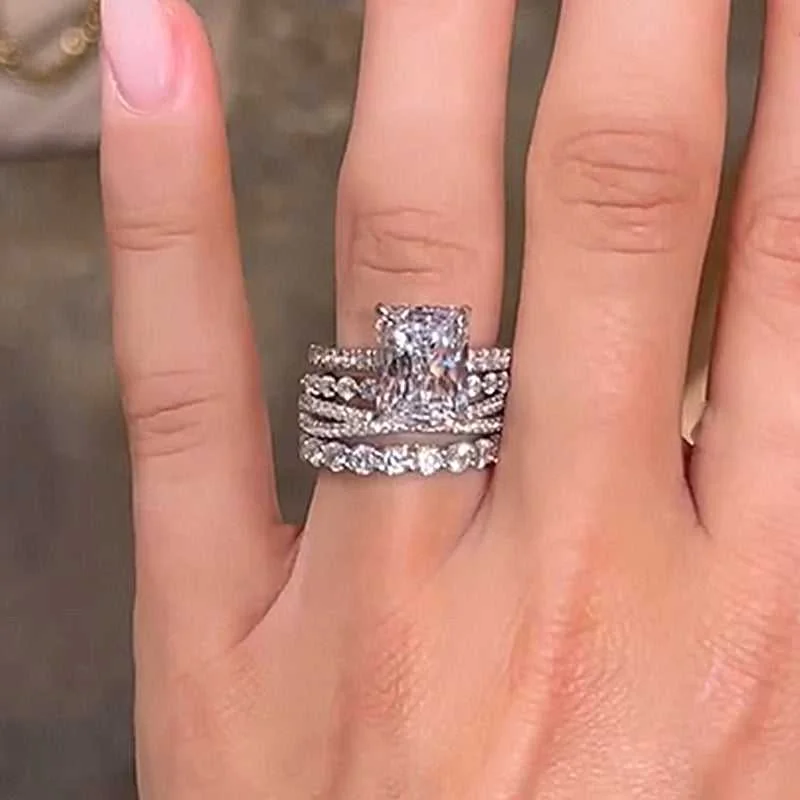 Excellent Crushed Ice Radiant Cut 4PC Wedding Ring Set