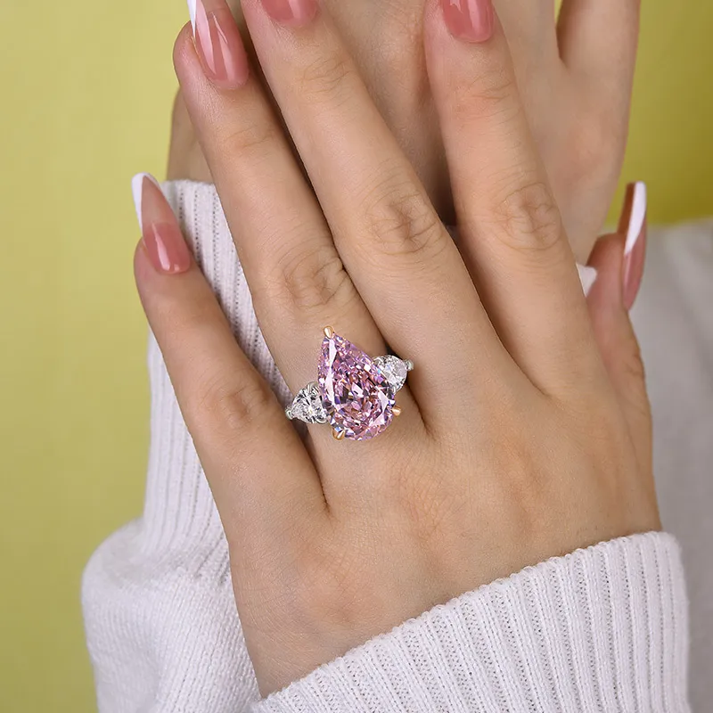 Gorgeous Pear Cut Pink Sapphire Three Stone Engagement Ring