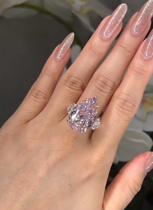 Gorgeous Pear Cut Pink Sapphire Three Stone Engagement Ring