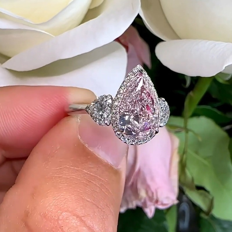 Gorgeous Pear Cut Pink Sapphire Three Stone Engagement Ring