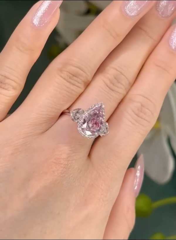 Gorgeous Pear Cut Pink Sapphire Three Stone Engagement Ring