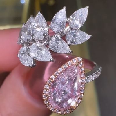 Elegant Pink Halo Pear Cut Bridal Ring Set In Sterling Silver