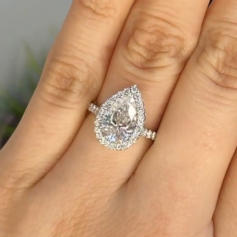 Unique Pear Cut Simulated Diamond Engagement Ring In Sterling Silver