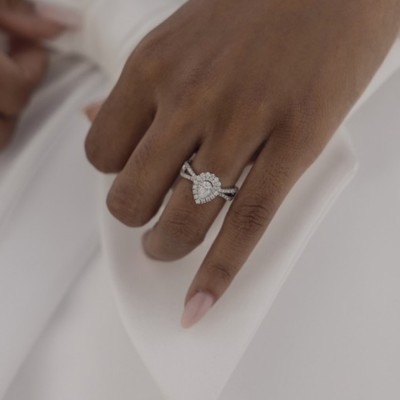 Unique Pear Cut Simulated Diamond Engagement Ring In Sterling Silver