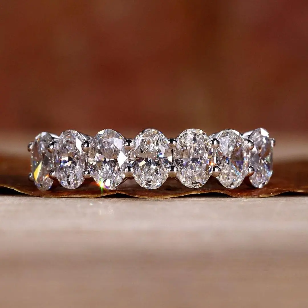 1.4CT Oval Cut Moissanite Wedding Band In Sterling Silver