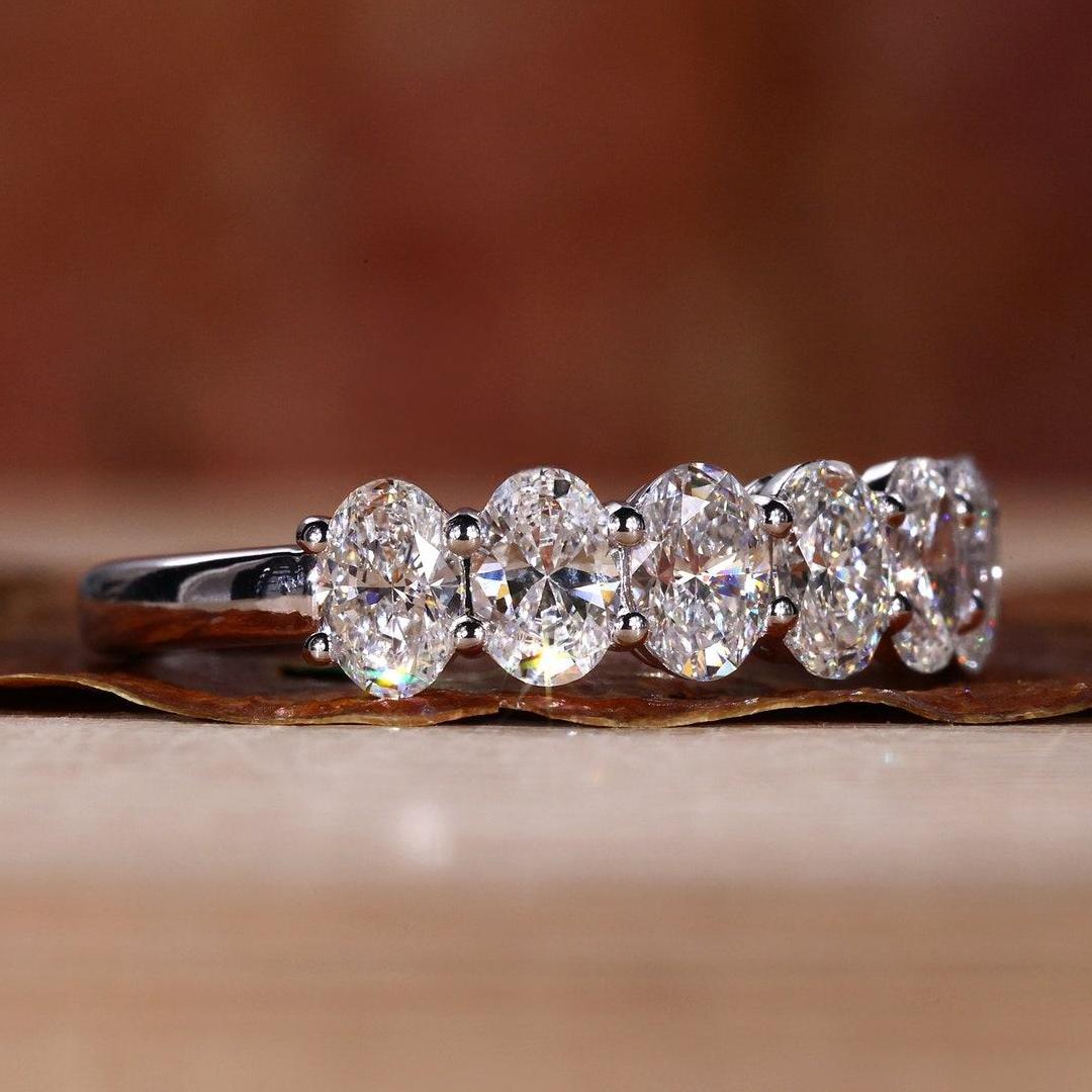 1.4CT Oval Cut Moissanite Wedding Band In Sterling Silver