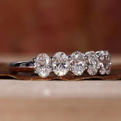 1.4CT Oval Cut Moissanite Wedding Band In Sterling Silver