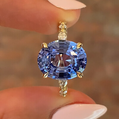 2CT Blue Oval Cut High Carbon Stone & Colorless Moissanite Engagement Ring In Sterling Silver