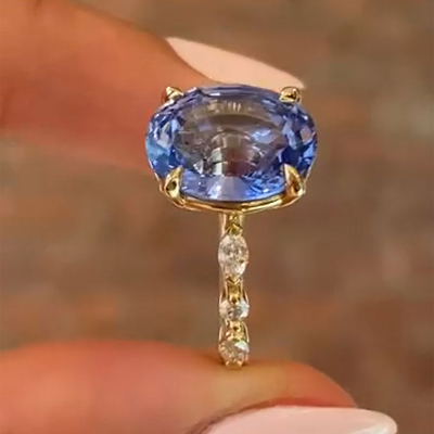 2CT Blue Oval Cut High Carbon Stone & Colorless Moissanite Engagement Ring In Sterling Silver