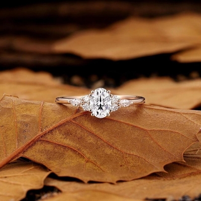 0.55CT Oval & Round Cut Moissanite Engagement Ring In Sterling Silver