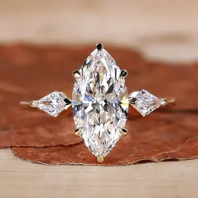 2CT Marquise Moissanite Center Stone Engagement Ring With Kite Cut Diamond Accents In Sterling Silver