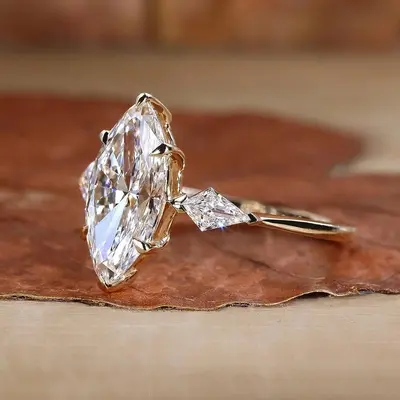 2CT Marquise Moissanite Center Stone Engagement Ring With Kite Cut Diamond Accents In Sterling Silver