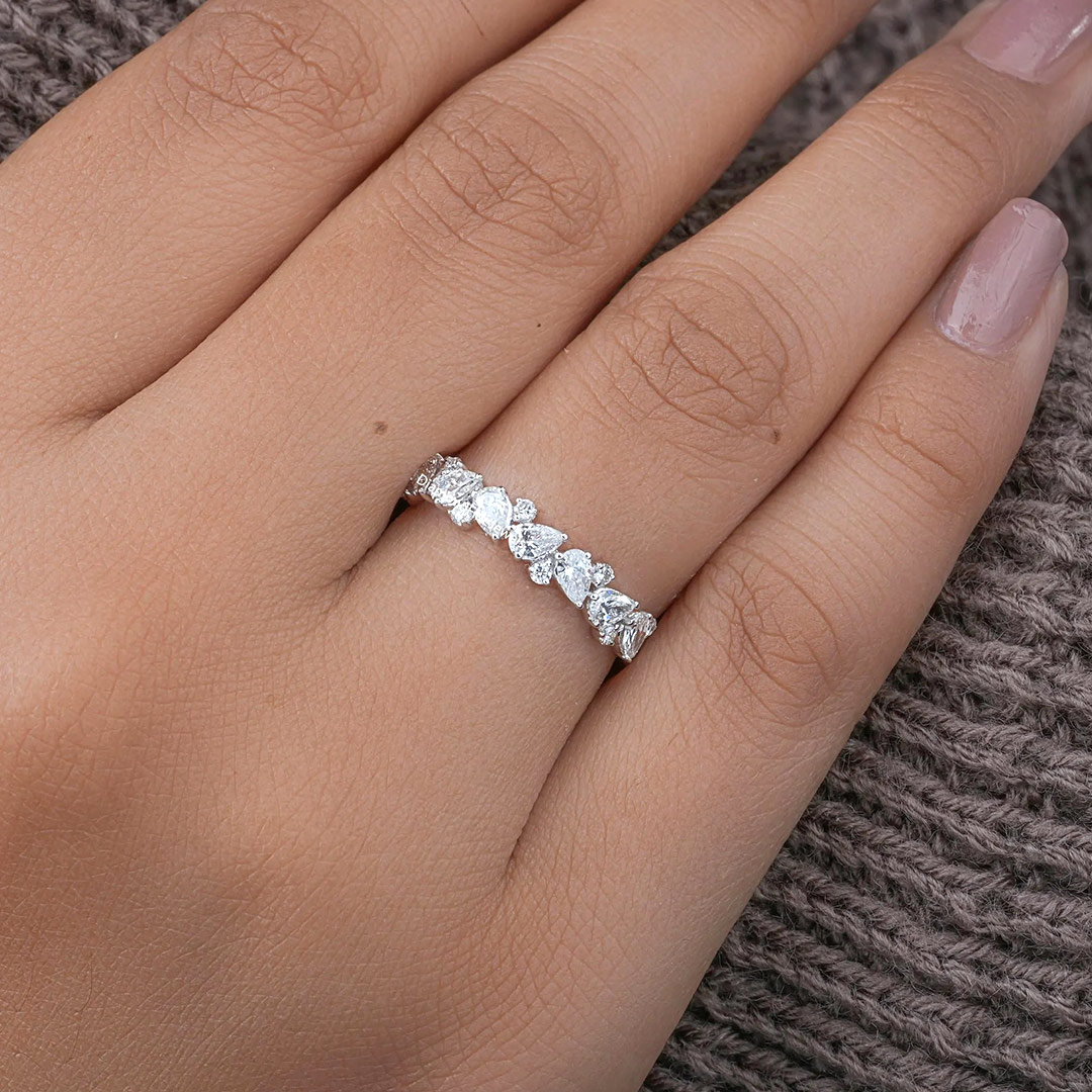 Pear Cut Moissanite Wedding Bands In Sterling Silver