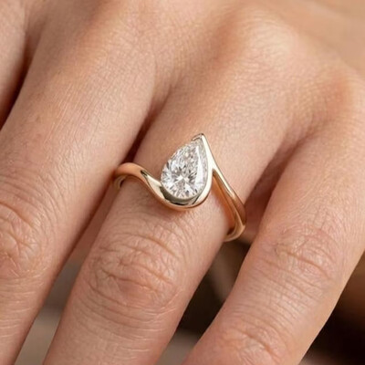 7*10MM Pear Cut Moissanite Engagement Rings In Sterling Silver