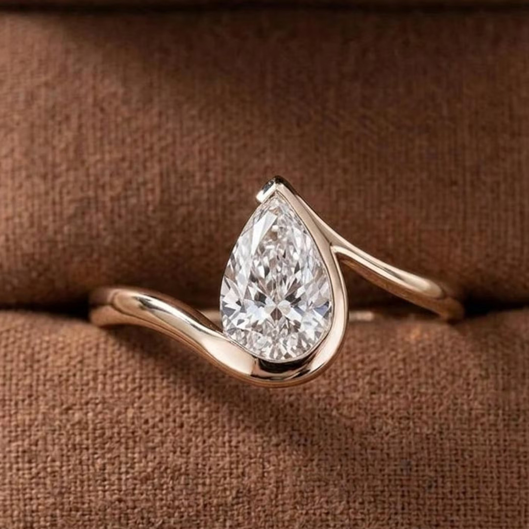 7*10MM Pear Cut Moissanite Engagement Rings In Sterling Silver
