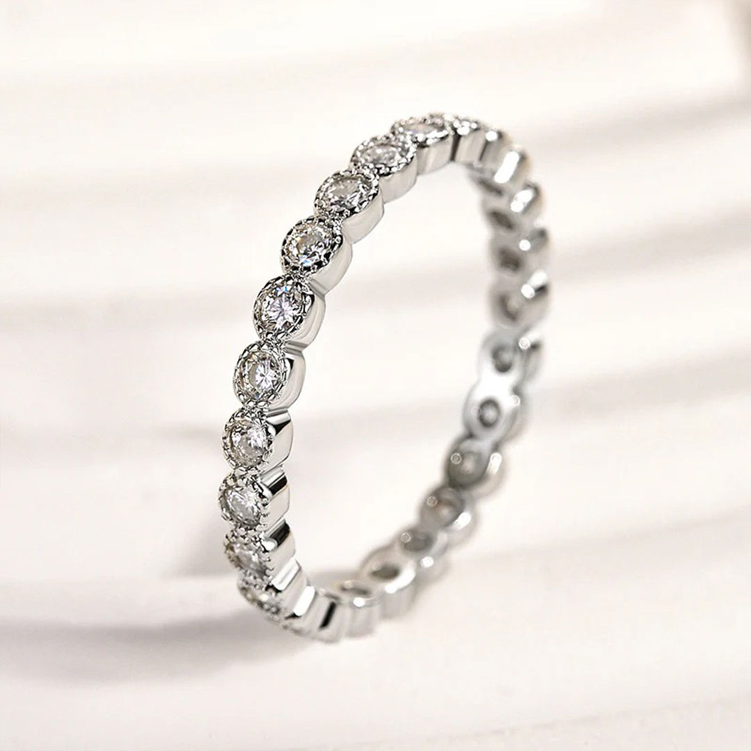 Round Cut Moissanite Wedding Bands In Sterling Silver