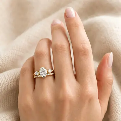 2CT 7*9mm Oval Cut Moissanite Engagement Rings Sets In Sterling Silver