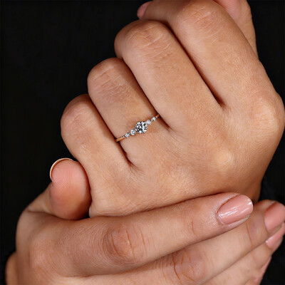 0.74CT 5*5mm Round Cut Moissanite Engagement Rings In Sterling Silver