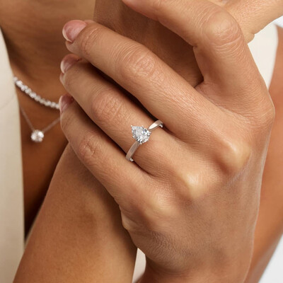 1.25ct 6x8mm Pear Cut Moissanite Engagement Rings In Sterling Silver