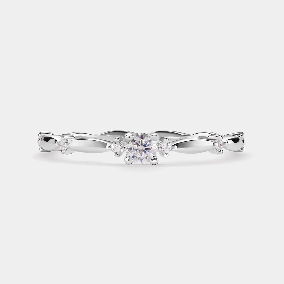 0.5CT 5*5MM Round Cut Moissanite Engagement Rings In Sterling Silver