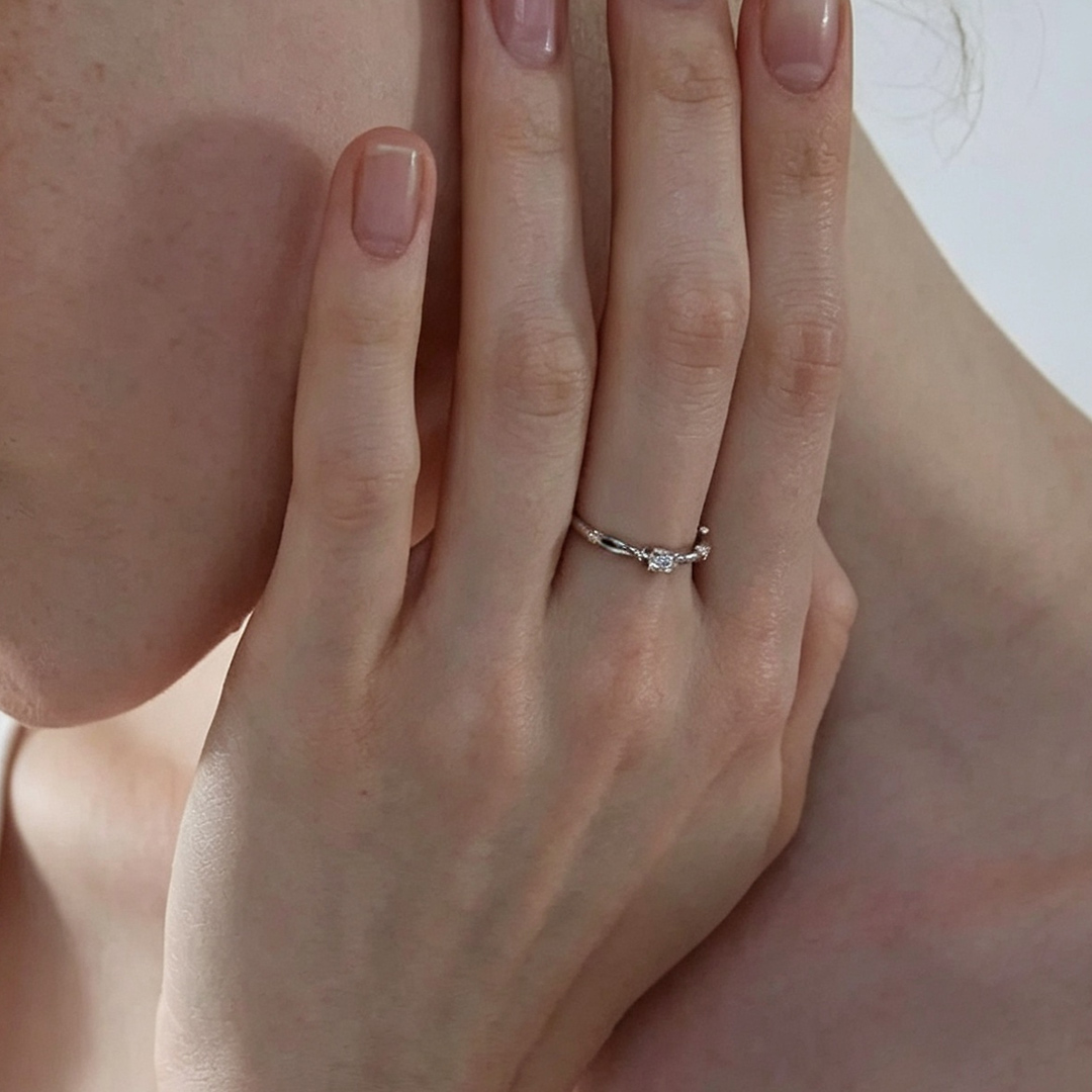 0.5CT 5*5MM Round Cut Moissanite Engagement Rings In Sterling Silver