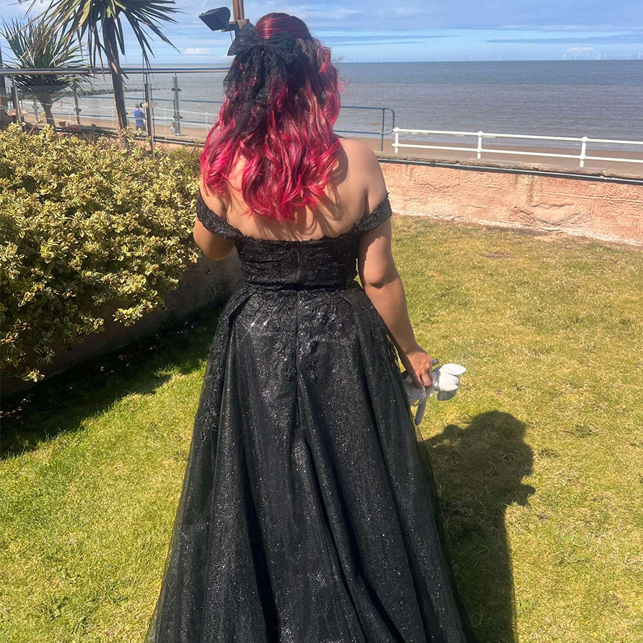 The straps were very loose and I had to have them altered but it was a stunning dress in black