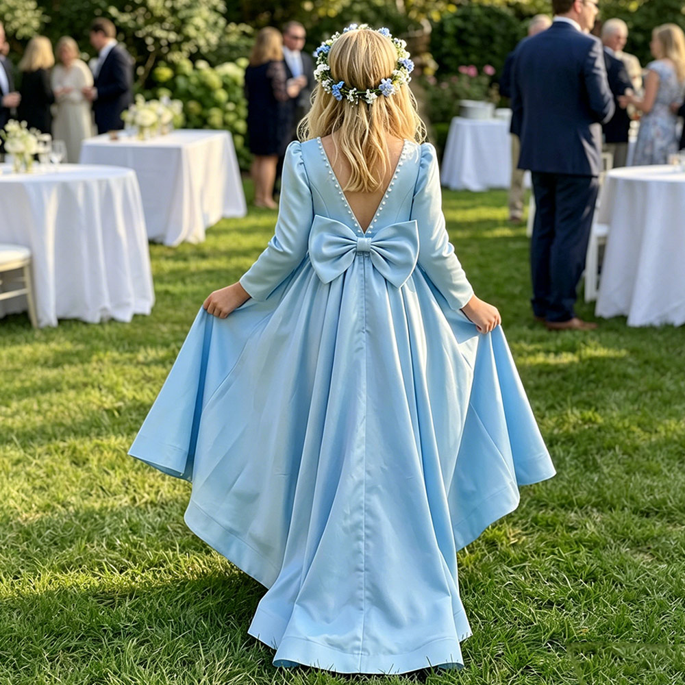 My daughter wore this for her First Communion. It was simple, elegant, and the blue satin was bright and clean. The 3/4 sleeves were great for the air-conditioned church. It fits a bit snug in the arms if your child is muscular, so maybe size up if you are worried about comfort. It photographed beautifully.