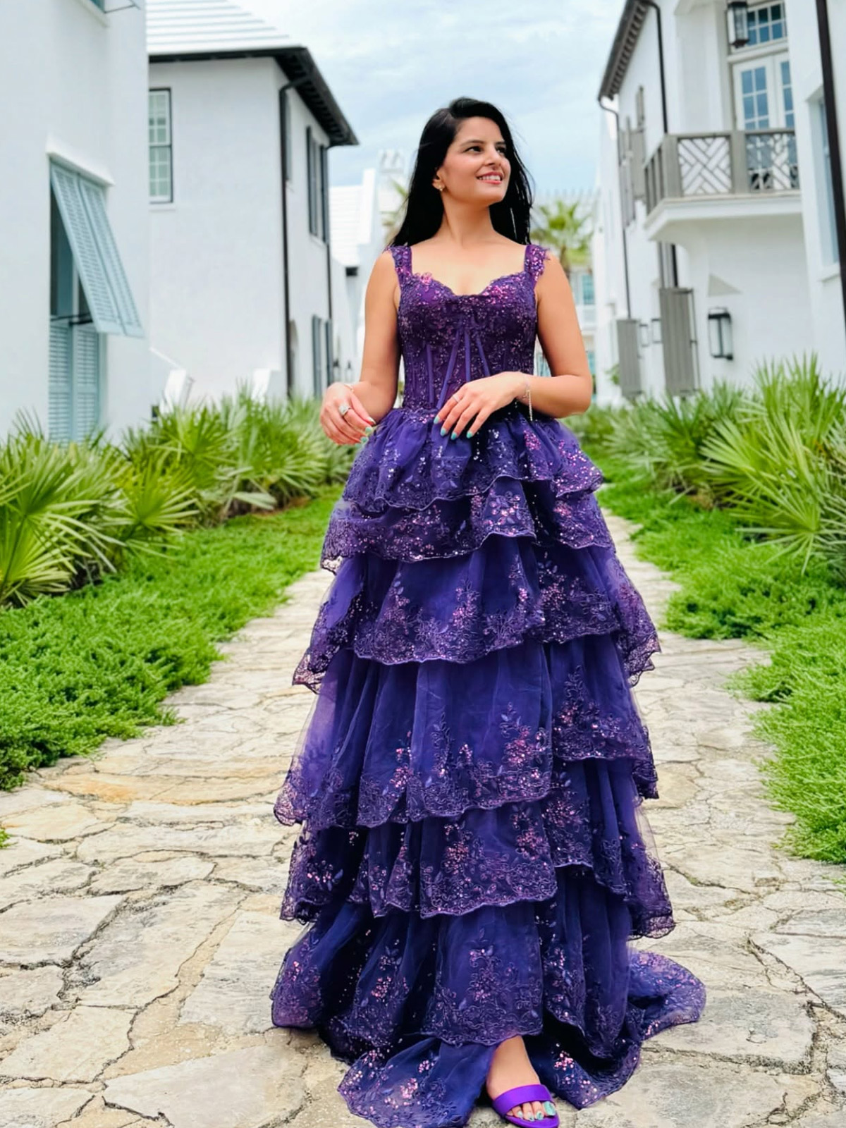 Pure fairytale magic! 💜✨ Step into your own dream world with our breathtaking purple tiered gown.
