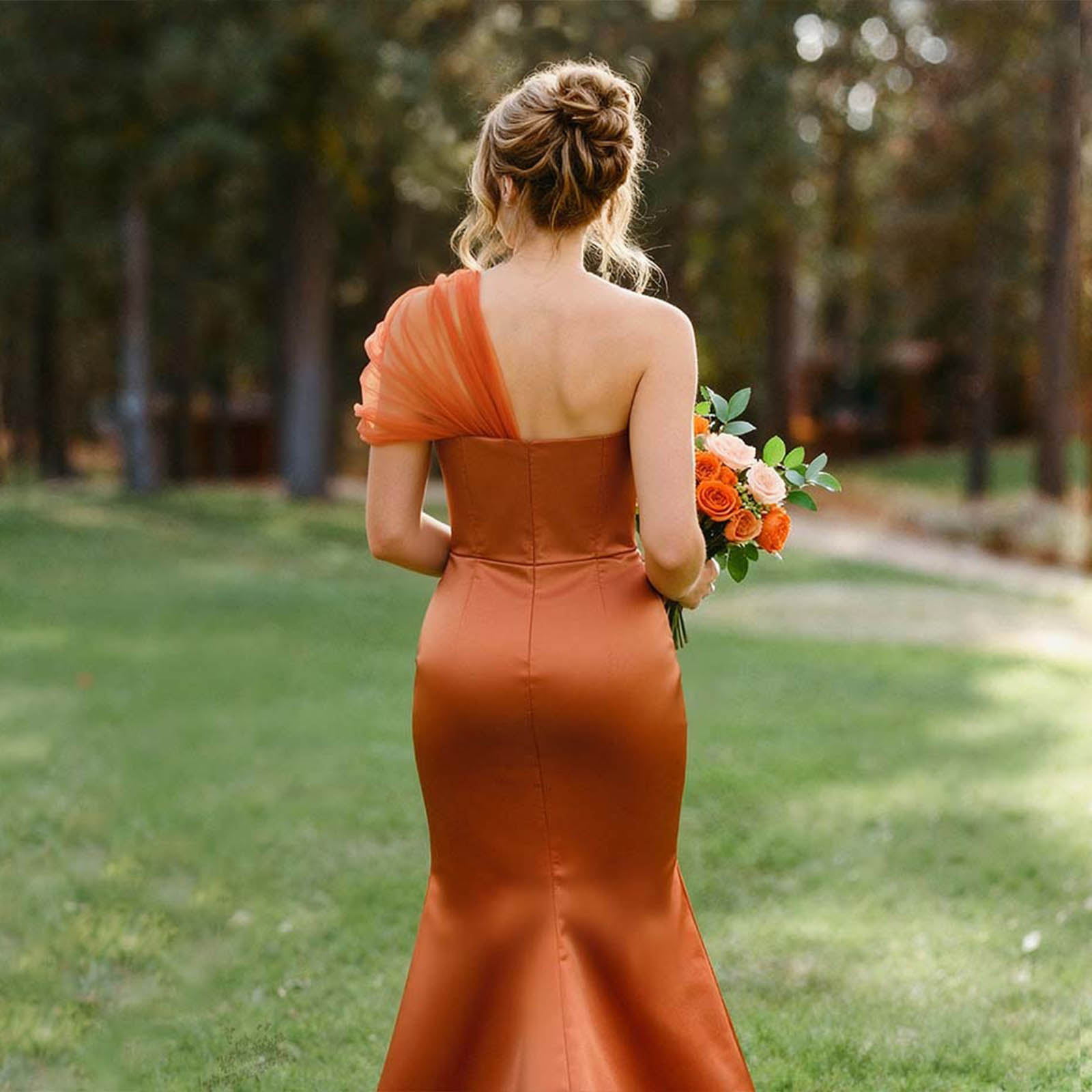 This dress is super flattering. I'm not usually one for bold styles, but this one really works. The silhouette is amazing, and the material has a lovely subtle sheen. I wore it to a cocktail party and felt like a million bucks. Highly recommend if you're looking for something chic.