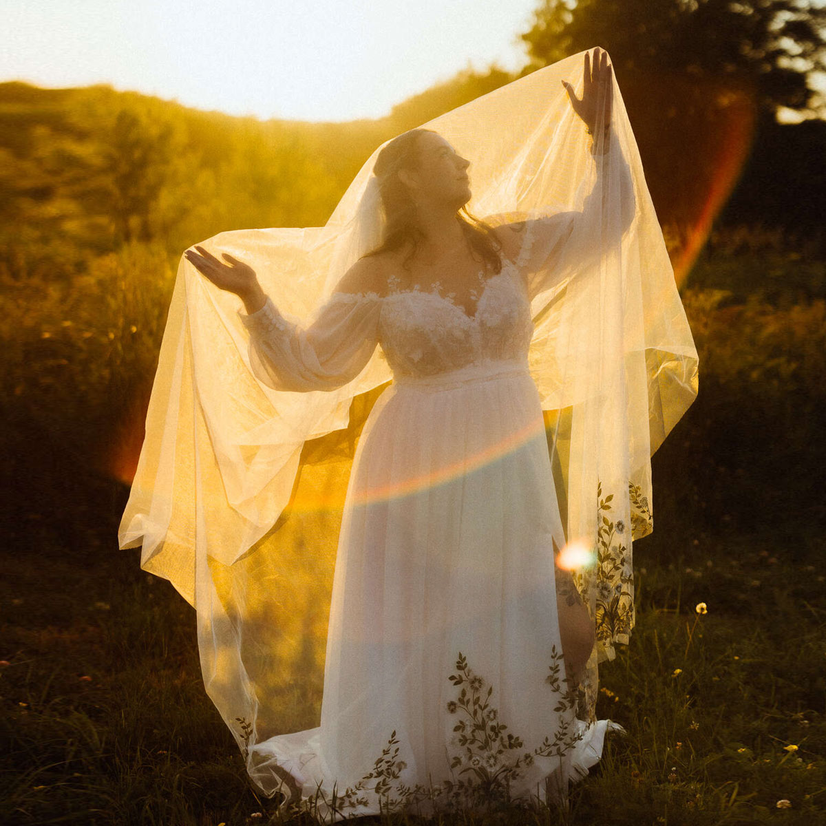 Dress is so beautiful! definitely a good choice for a cheaper but still looks expensive wedding dress! very flowly was perfect for a hot summer 84° and evening into mid-low 70°! some of the flowers fell off but not too many!